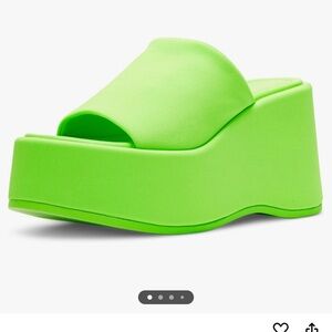 Madden Girl platform slides.
